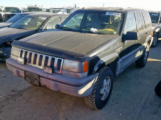 1J4GZ58Y4SC679021 - 1995 JEEP GRAND CHER BLACK photo 2