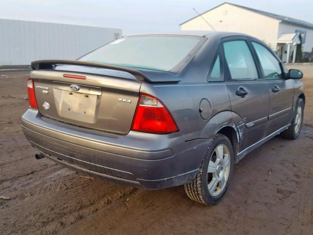 1FAFP34N45W268587 - 2005 FORD FOCUS ZX4 BROWN photo 4