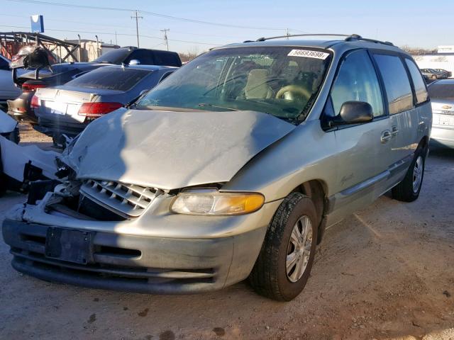 1P4GP45G4XB579463 - 1999 PLYMOUTH VOYAGER SE GREEN photo 2