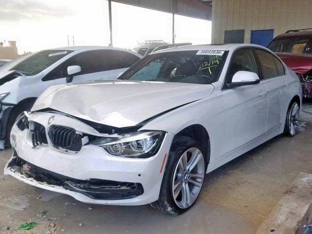 WBA8B9G32HNU53064 - 2017 BMW 330 I WHITE photo 2