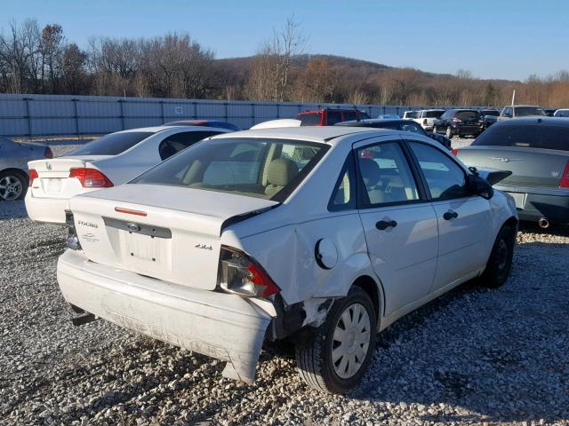 1FAFP34N56W114651 - 2006 FORD FOCUS ZX4 BLACK photo 4