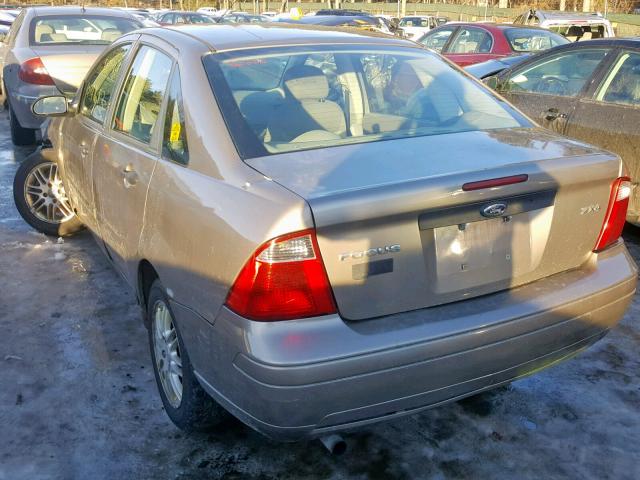 1FAFP34N95W191456 - 2005 FORD FOCUS ZX4 TAN photo 3