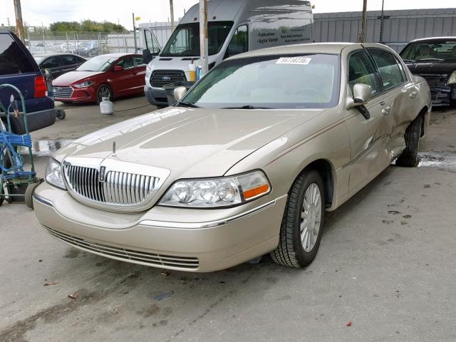 1LNHM81W84Y679916 - 2004 LINCOLN TOWN CAR E GOLD photo 2