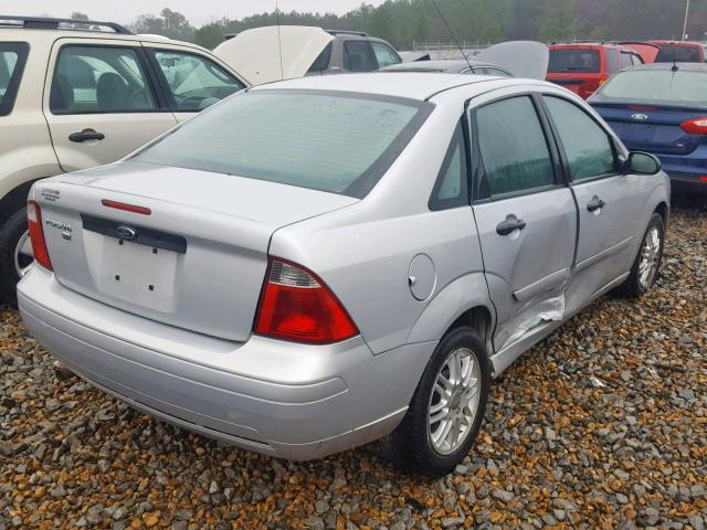 1FAFP34NX7W117546 - 2007 FORD FOCUS ZX4 GRAY photo 4