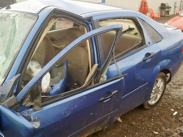 1FAFP34N25W220554 - 2005 FORD FOCUS ZX4 BLUE photo 10