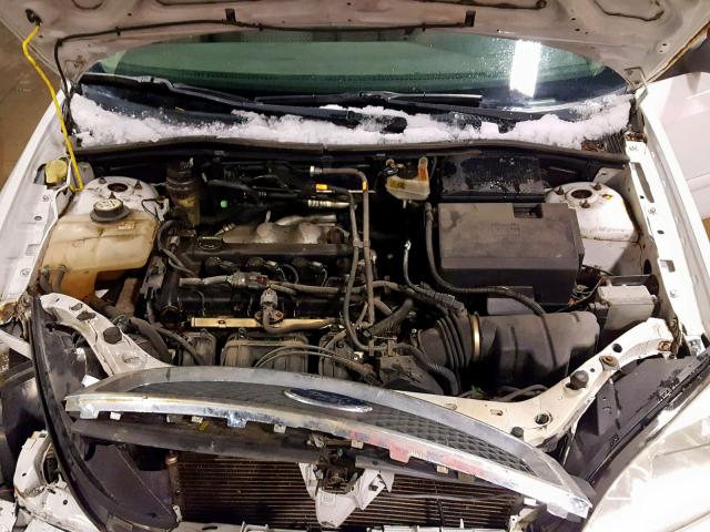 1FAFP34N75W302067 - 2005 FORD FOCUS ZX4 WHITE photo 7