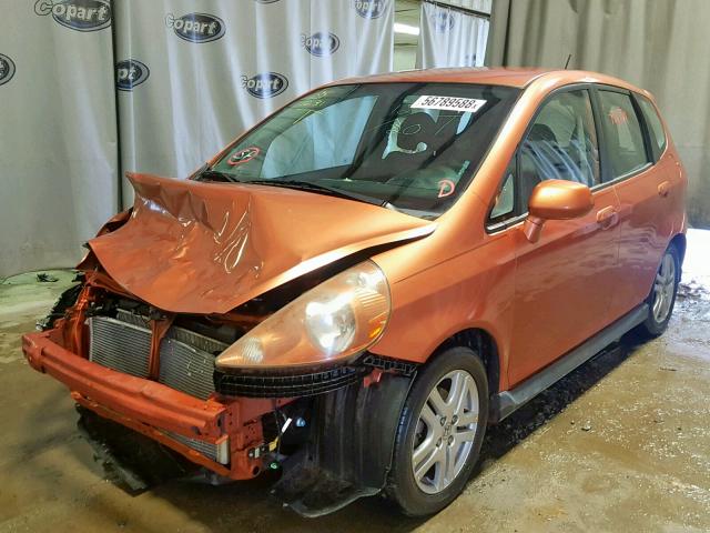 JHMGD37668S008181 - 2008 HONDA FIT SPORT ORANGE photo 2