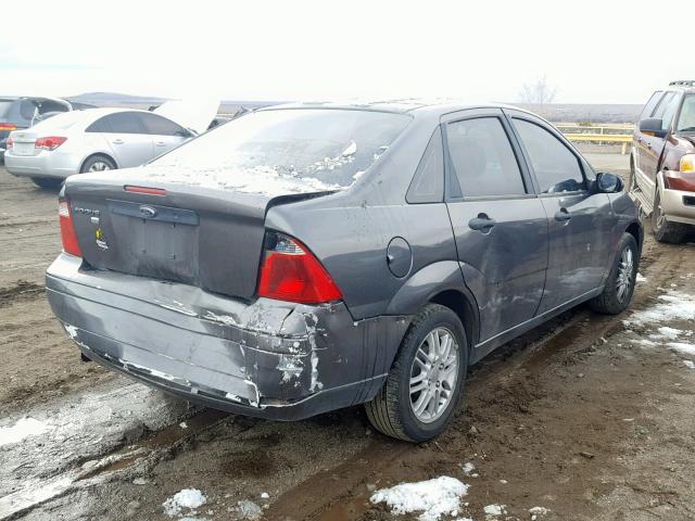 1FAFP34N67W244360 - 2007 FORD FOCUS ZX4 GRAY photo 4