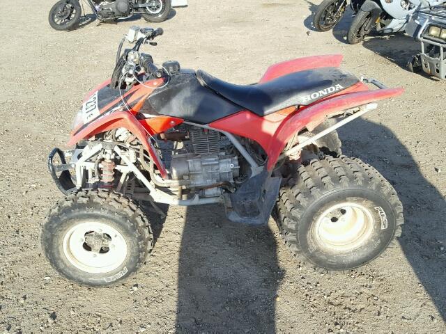 1HFTE270764504049 - 2006 HONDA TRX250 EX RED photo 9