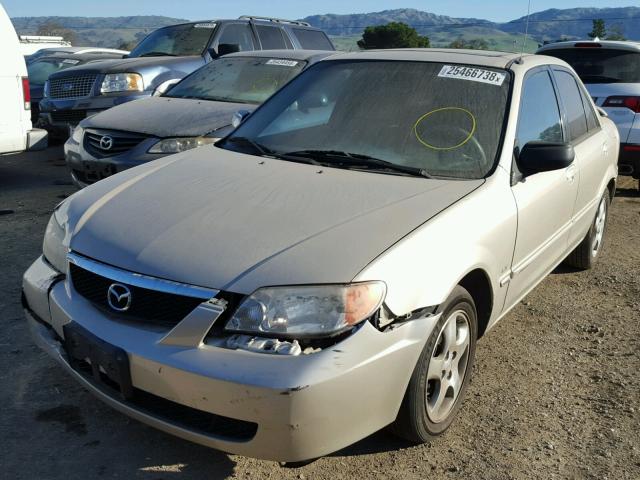 JM1BJ225320544456 - 2002 MAZDA PROTEGE DX GOLD photo 2