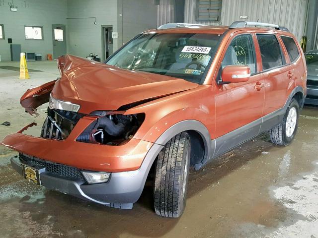 KNDJH741695013067 - 2009 KIA BORREGO LX ORANGE photo 2