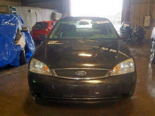 1FAFP34N35W287308 - 2005 FORD FOCUS ZX4 BLACK photo 9