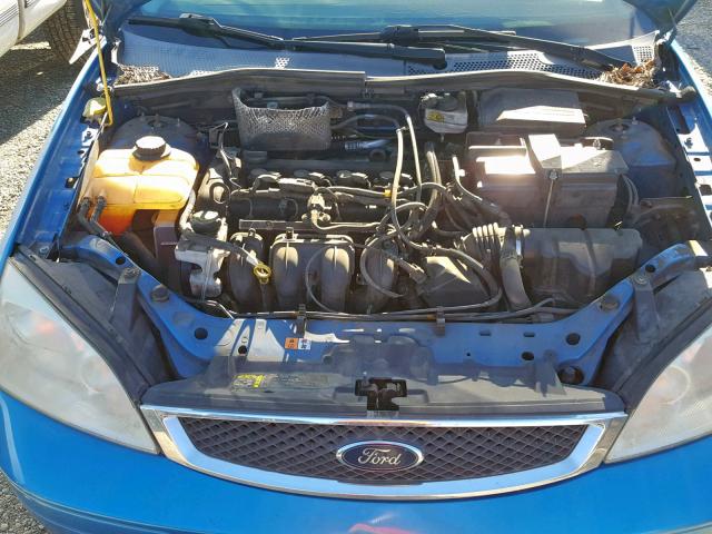 1FAFP34NX7W323143 - 2007 FORD FOCUS ZX4 BLUE photo 7