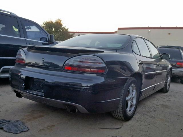 1G2WP52KX1F164733 - 2001 PONTIAC GRAND PRIX BLACK photo 4