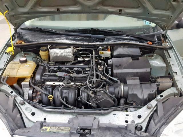 1FAFP34N95W174754 - 2005 FORD FOCUS ZX4 GREEN photo 7