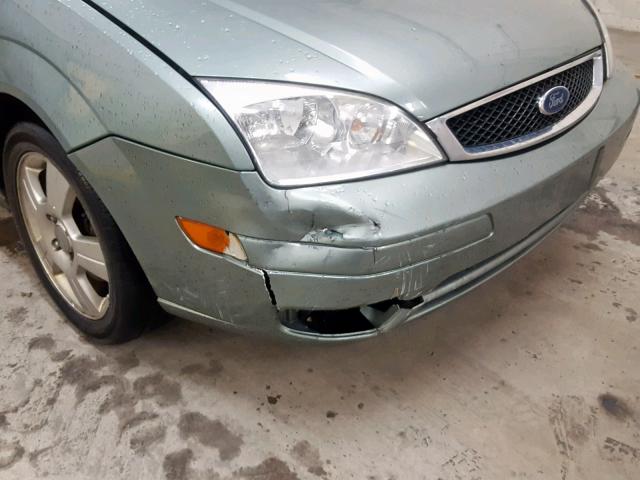 1FAFP34N95W174754 - 2005 FORD FOCUS ZX4 GREEN photo 9