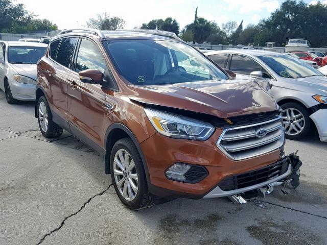 1FMCU0J90HUB12909 - 2017 FORD ESCAPE TIT ORANGE photo 1