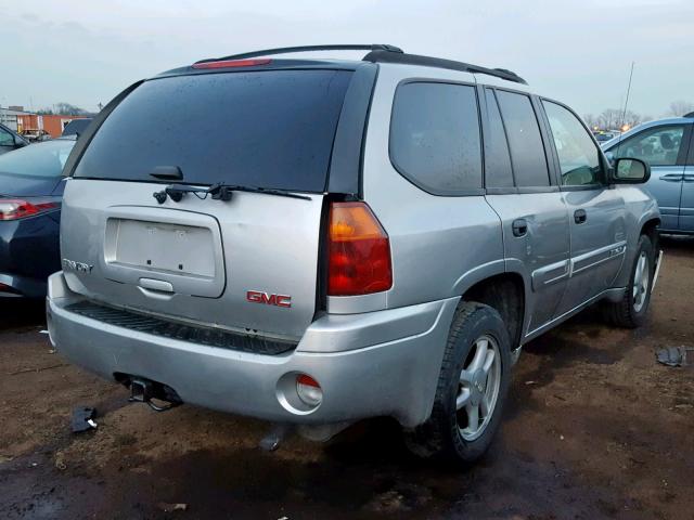 1GKDT13S452120329 - 2005 GMC ENVOY SILVER photo 4