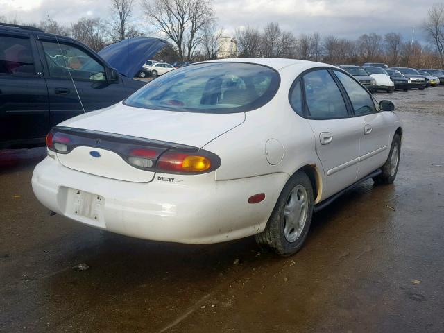 1FALP52UXVG201804 - 1997 FORD TAURUS GL WHITE photo 4