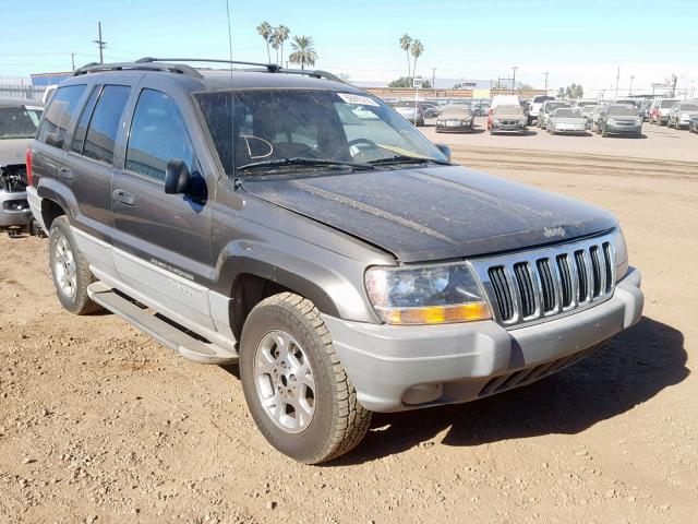 1J4GW48S0YC333989 - 2000 JEEP GRAND CHER BROWN photo 1