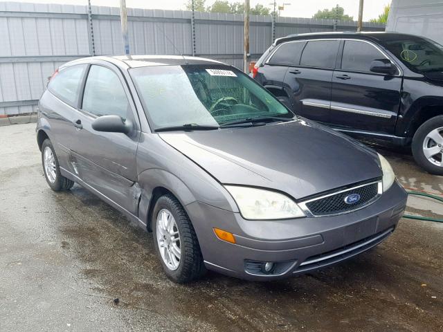 1FAFP31N07W117379 - 2007 FORD FOCUS ZX3 GRAY photo 1