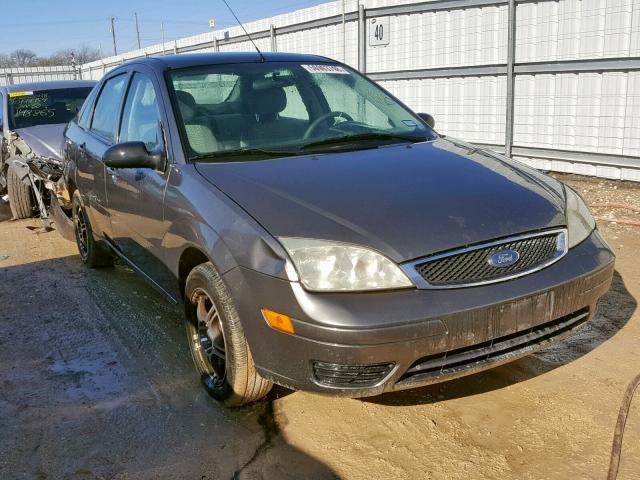 1FAFP34N77W200125 - 2007 FORD FOCUS ZX4 GRAY photo 1