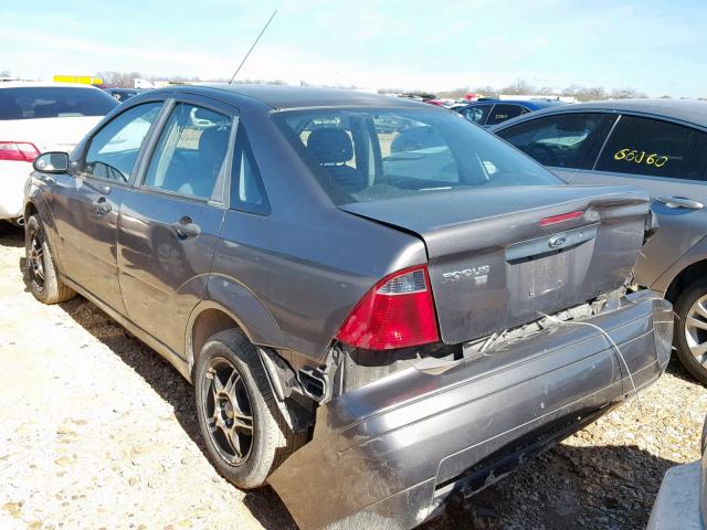 1FAFP34N77W200125 - 2007 FORD FOCUS ZX4 GRAY photo 3