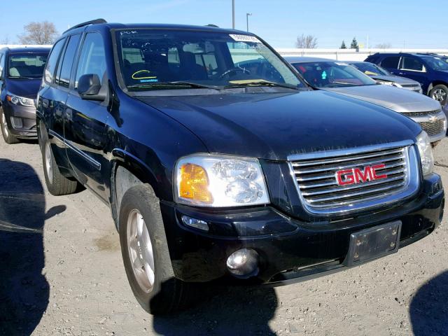 1GKDT13S572213704 - 2007 GMC ENVOY BLACK photo 1