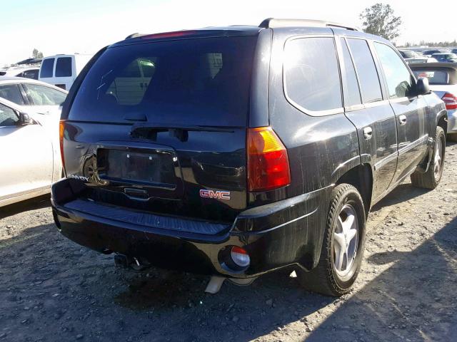 1GKDT13S572213704 - 2007 GMC ENVOY BLACK photo 4