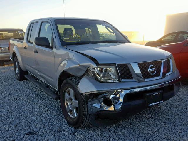 1N6AD09U07C404436 - 2007 NISSAN FRONTIER C SILVER photo 1