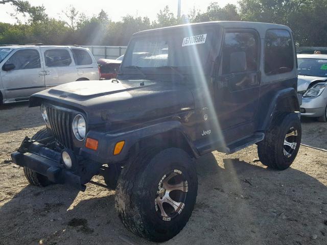 1J4FA59SX1P317781 - 2001 JEEP WRANGLER / BLACK photo 2