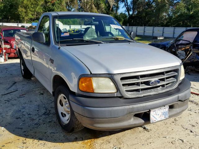 2FTRF17274CA76252 - 2004 FORD F-150 HERI SILVER photo 1