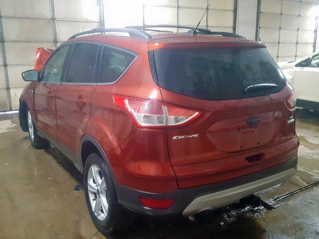 1FMCU0G99EUD29930 - 2014 FORD ESCAPE SE ORANGE photo 3