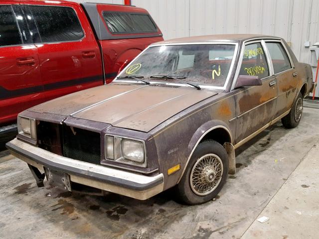 1G4XC69R7FW452619 - 1985 BUICK SKYLARK X- MAROON photo 2