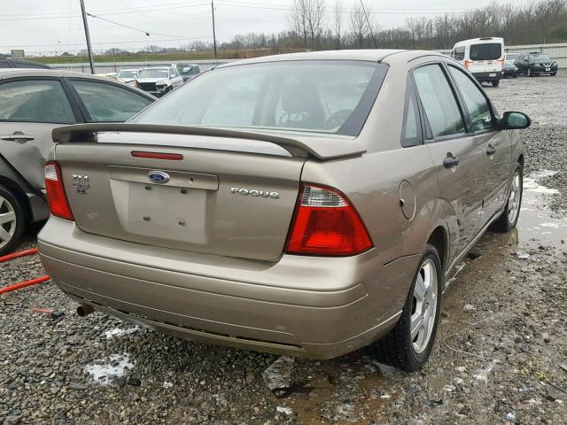 1FAFP34N35W268984 - 2005 FORD FOCUS ZX4 BROWN photo 4