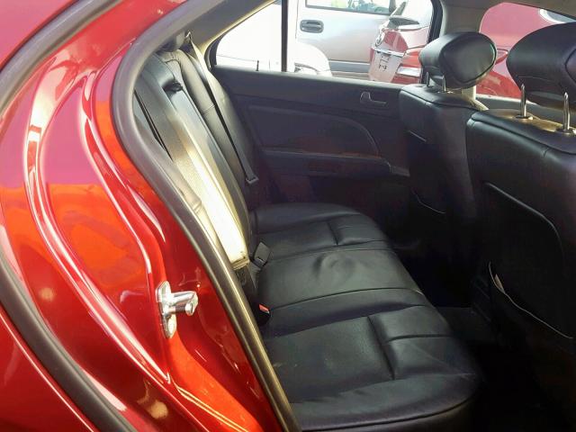1G6DC67A780211091 - 2008 CADILLAC STS RED photo 6