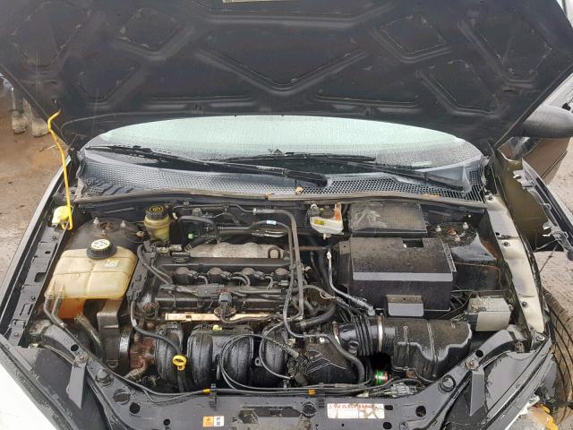 1FAFP34N35W283677 - 2005 FORD FOCUS ZX4 BLACK photo 7