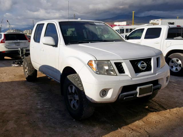 1N6AD07W09C414620 - 2009 NISSAN FRONTIER C WHITE photo 1