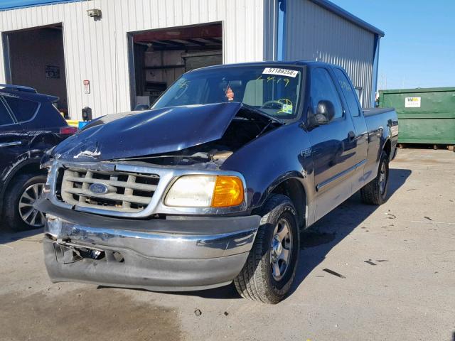 2FTRX172X4CA92071 - 2004 FORD F-150 HERI BLUE photo 2