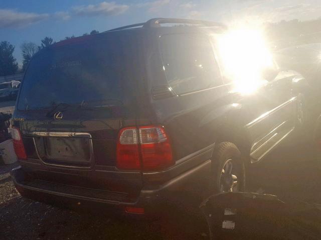 JT6HT00W5X0048870 - 1999 LEXUS LX 470 BLACK photo 4