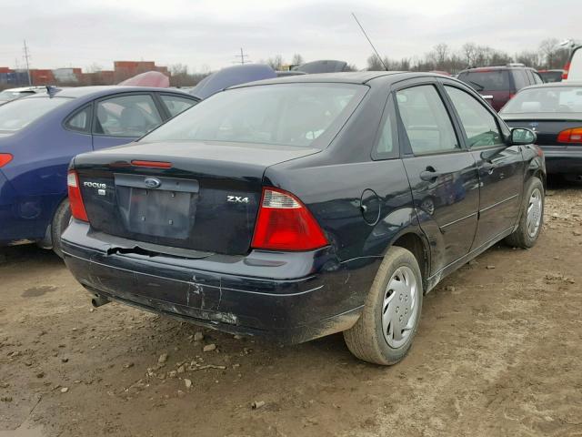 1FAFP34N06W188320 - 2006 FORD FOCUS ZX4 BLACK photo 4