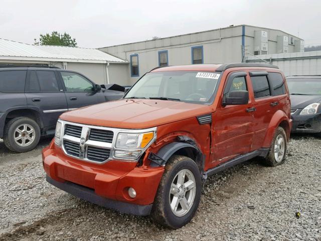 1D8GU28K87W661496 - 2007 DODGE NITRO SXT ORANGE photo 2