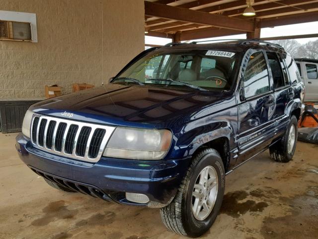 1J8GX48SX2C320699 - 2002 JEEP GRAND CHER BLUE photo 2