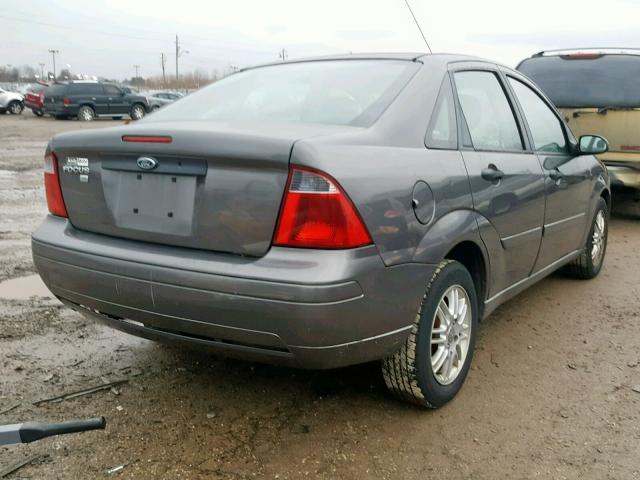 1FAFP34N47W298997 - 2007 FORD FOCUS ZX4 GRAY photo 4