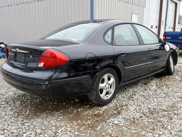 1FAFP55U42G186284 - 2002 FORD TAURUS SES BLACK photo 4