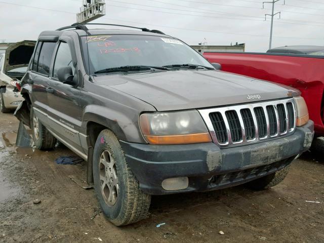 1J4GW58S5XC658058 - 1999 JEEP GRAND CHER GRAY photo 1