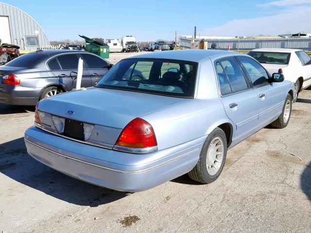 2FAFP74WXYX127757 - 2000 FORD CROWN VICT BLUE photo 4