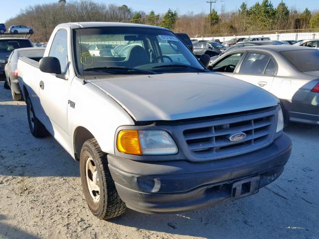 2FTRF17234CA90763 - 2004 FORD F-150 HERI SILVER photo 1