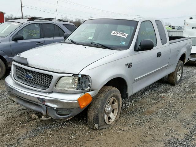 2FTRX18W64CA45279 - 2004 FORD F-150 HERI SILVER photo 2