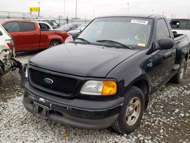 2FTRF072X4CA88129 - 2004 FORD F-150 HERI BLACK photo 2